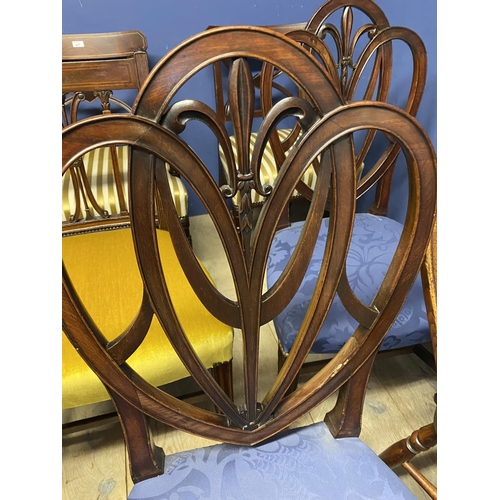 607 - Set of four Regency mahogany dining chairs (3 + carver), upholstered with overstuffed striped silk s... 