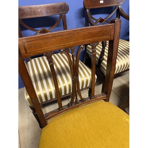 607 - Set of four Regency mahogany dining chairs (3 + carver), upholstered with overstuffed striped silk s... 