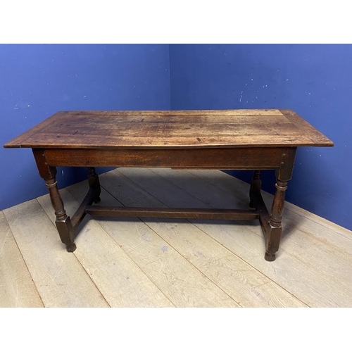 614 - A good Regency mahogany and rosewood circular snap top dining table, with brass edgings, on an octag... 