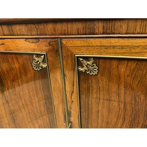 615 - A good Regency rosewood side cabinet with  adjustable shelves beneath a white marble top, 105cmL x 9... 