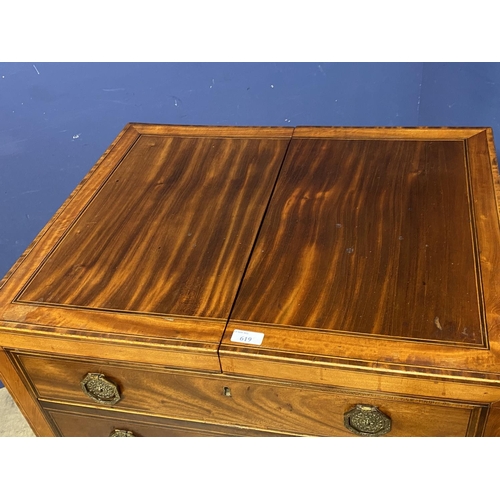 619 - A Regency inlaid and cross banded figured mahogany fold over washstand, with fitted interior, on tap... 