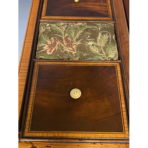 619 - A Regency inlaid and cross banded figured mahogany fold over washstand, with fitted interior, on tap... 