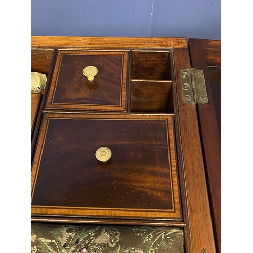 619 - A Regency inlaid and cross banded figured mahogany fold over washstand, with fitted interior, on tap... 