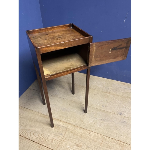 622 - A small mahogany side table, tapered legs, cupboard door to front 36 x 77Hcm