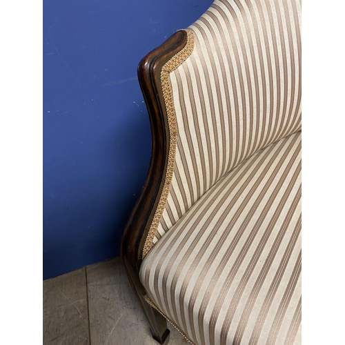 627 - Edwardian show framed settee , upholstered in a striped fabric. Dimensions are: 95 cm height, 72 cm ... 