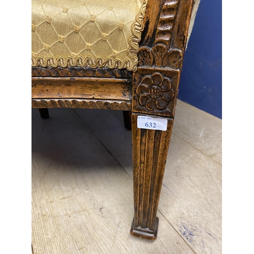 632 - A mahogany framed tub chair, upholstered in a worn yellow fabric, some repair needed