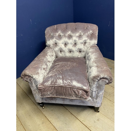 639 - ANDREW MARTIN Large buttoned back armchair, upholstered in a velvet style mauve coloured designer fa... 