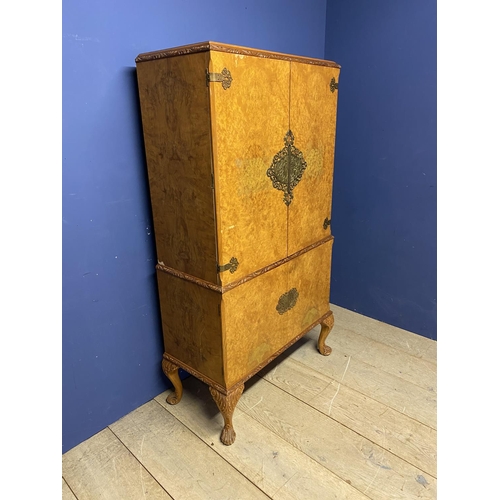 643 - .Art Deco style veneered drinks cabinet, with fitted mirrored interior,  some minor wear and losses