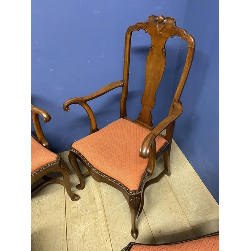 664 - A set of four (2 +2carvers) mahogany dining chairs, with serpentine drop in orange upholstered seats... 