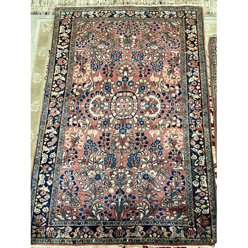 698 - Two small antique rugs pattern blues/reds, 100 x 147 and 67 x 122, slight fray at ends