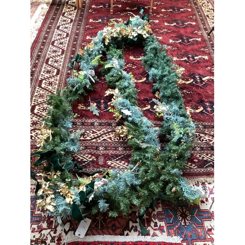 737 - CHRISTMAS: Door garland, with white poinsettia, pine cones, and gold coloured holly, Green Ribbons e... 