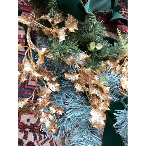 737 - CHRISTMAS: Door garland, with white poinsettia, pine cones, and gold coloured holly, Green Ribbons e... 