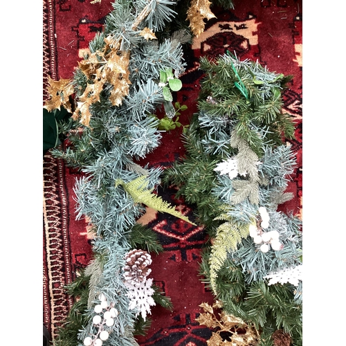 737 - CHRISTMAS: Door garland, with white poinsettia, pine cones, and gold coloured holly, Green Ribbons e... 