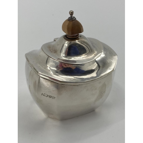 87 - A sterling silver oval condiment holder, and an Art Deco style silver sugar, 402g