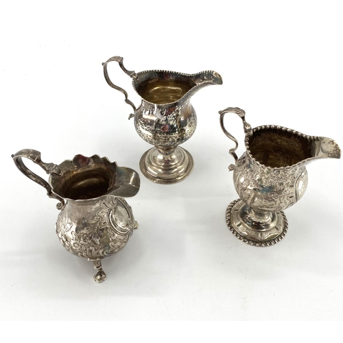 89 - Three sterling silver cream jugs, early C19th, various makers, dates, 245g