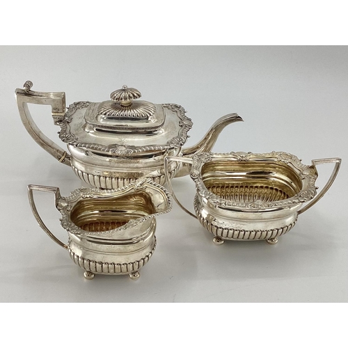 9 - A sterling silver 3 piece tea set of half reeded design by JW Story and W Elliot, London 1812, 1300g... 