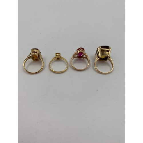 96 - A collection of gold gem set and paste rings, two 18ct, one 15ct, one 9ct, total weight 19.5g