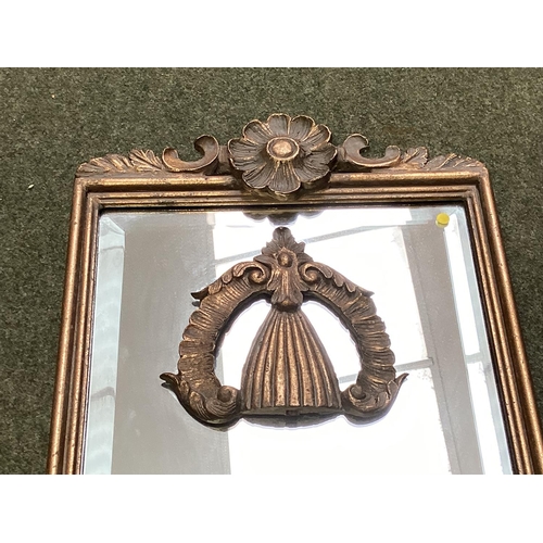 243 - Pair of rectangular gilt gesso wall mirrors with cup and swag decoration.  79 cm H x 35 cm W