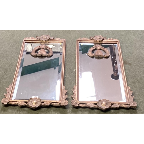 243 - Pair of rectangular gilt gesso wall mirrors with cup and swag decoration.  79 cm H x 35 cm W