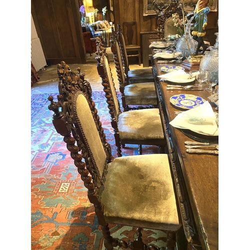 567 - A good set of 10 (8 + 2 carvers) Jacobean style heavily carved mahogany high back dining chairs, wit... 