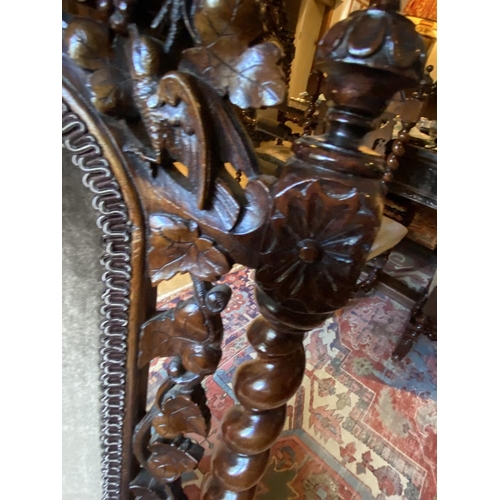 567 - A good set of 10 (8 + 2 carvers) Jacobean style heavily carved mahogany high back dining chairs, wit... 