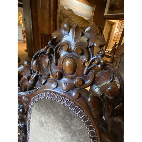 567 - A good set of 10 (8 + 2 carvers) Jacobean style heavily carved mahogany high back dining chairs, wit... 