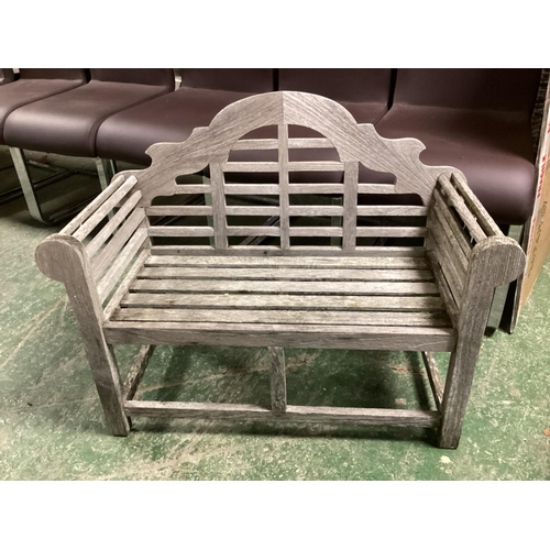 680 - A small teak garden bench (children size)