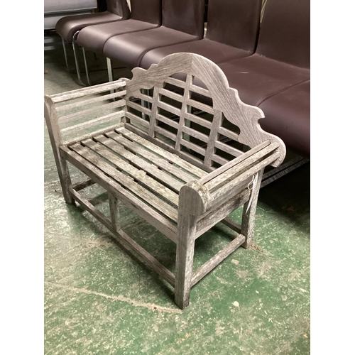 680 - A small teak garden bench (children size)