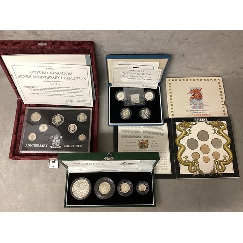 200 - A collection of silver and white metal commemorative  coins to include silver proof examples.