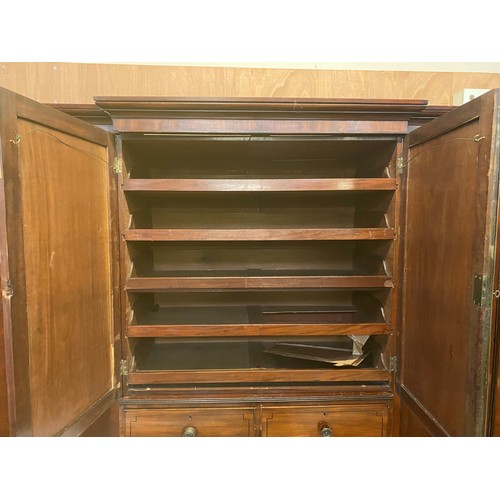 651 - Victorian figured mahogany compactum, flanked by hanging cupboards, the central section with 4 drawe... 