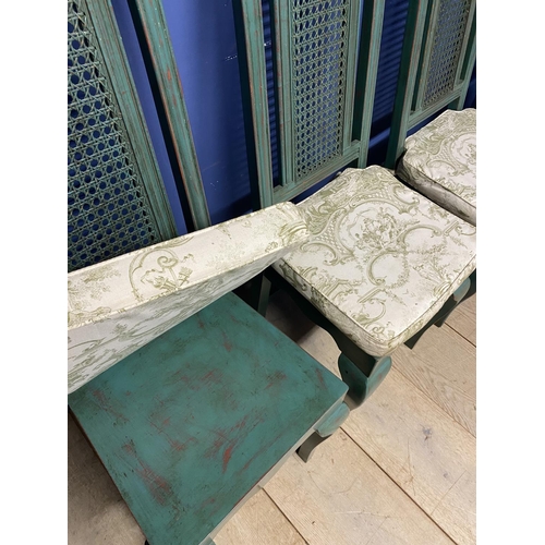 599 - A set of 4 GRAHAM CARR green painted bergere high backed dining chairs with loose cream tie on cushi... 