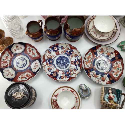 103 - Quantity of mixed china, to include Japanese Imari plates, Figurines, Copeland, Burslem, etc, see im... 