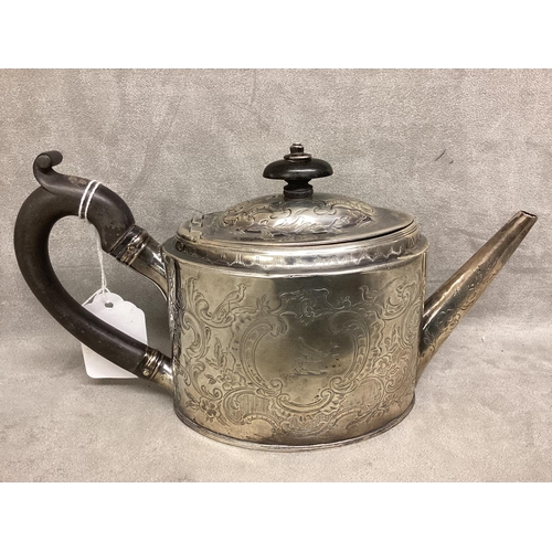 11 - A Georgian Sterling silver Bachelors tea pot, ebonised handle with chased scrolling decoration by Pe... 