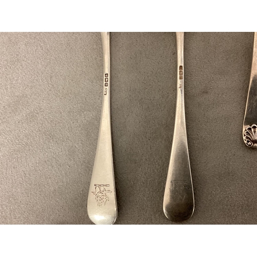 13 - A set of six Sterling silver tea spoon, with scallop finials together with a pair of Sterling silver... 