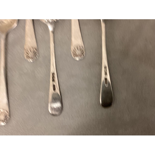 13 - A set of six Sterling silver tea spoon, with scallop finials together with a pair of Sterling silver... 