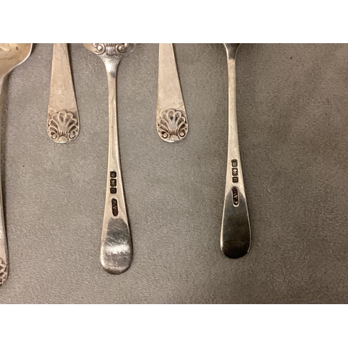 13 - A set of six Sterling silver tea spoon, with scallop finials together with a pair of Sterling silver... 