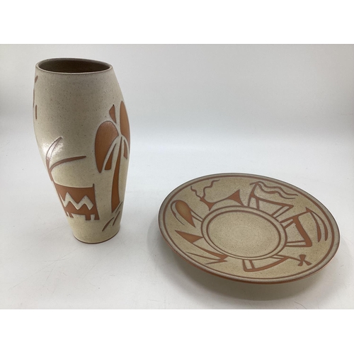 131 - Two pieces of Jordanian C20th Art Pottery, charger 34 diameter and vase 34cm H