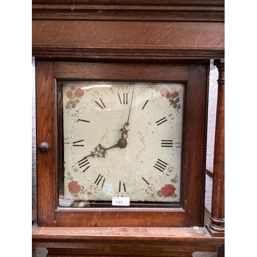 144 - A late C18th oak country style long case clock, oak case, square white painted face, Roman numeral m... 