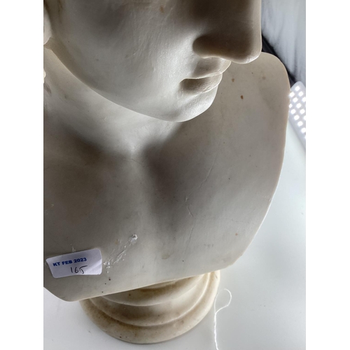 165 - A plaster bust of a classical figure on turned socle base together with a faux marble figure of a pa... 