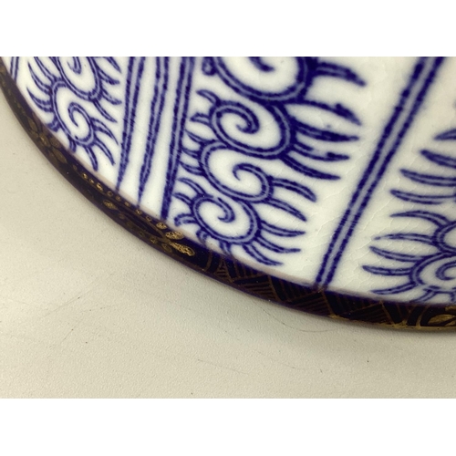 179 - An Oriental style Blue and White jug and bowl 17cmH