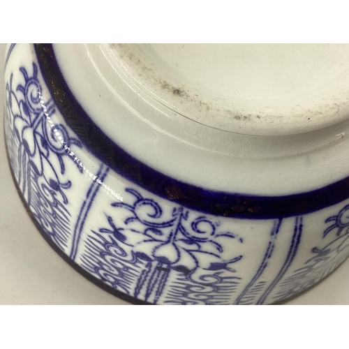 179 - An Oriental style Blue and White jug and bowl 17cmH