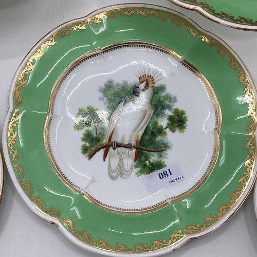 180 - A Collection of Staffordshire plates, gilt green borders with central hand painted birds together wi... 