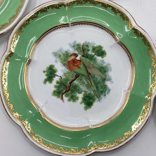 180 - A Collection of Staffordshire plates, gilt green borders with central hand painted birds together wi... 