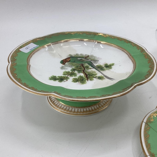 180 - A Collection of Staffordshire plates, gilt green borders with central hand painted birds together wi... 