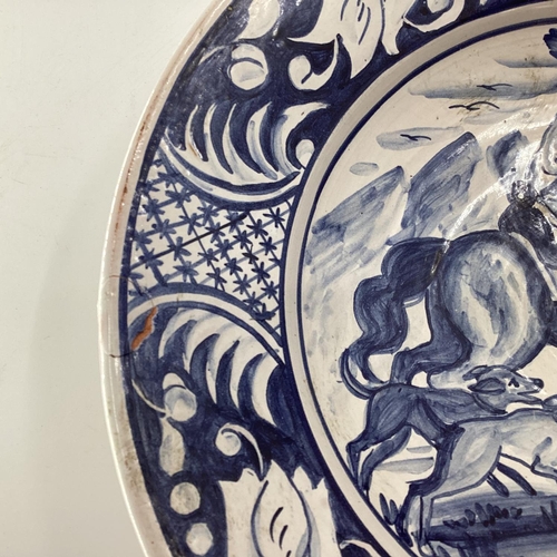 181 - A large Studio Pottery bowl together with a Delft Charger, and one other