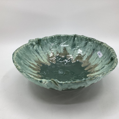 181 - A large Studio Pottery bowl together with a Delft Charger, and one other