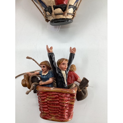 190 - A pair of decorative  papier Mache style hot air balloons, each 45cm H