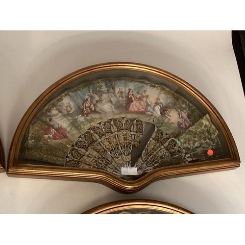 191 - Four C18/C9th style painted fans in a gilt glazed box, frames each 54 x 31cm, please ask for conditi... 