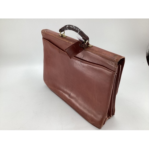 192 - A vintage tan leather attache or brief case, 43 x 37cm