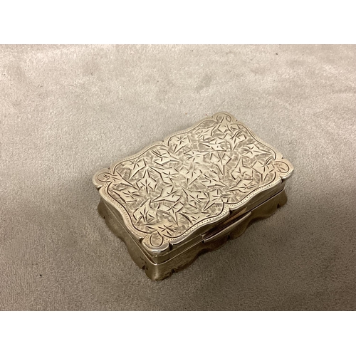 2 - A Sterling silver pocket snuff box with chased decoration by Joseph Gloster, Birmingham 1899, 48g